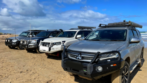 4WD tow vehicles on beach